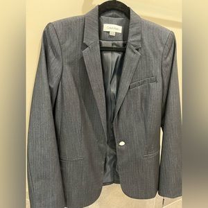 Calvin Klein blazer. New with tags. Deep blue with subtle striping pattern.